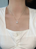 Classic Diamond Pendant with Natural Freshwater Pearl in Sterling Silver by NEPTUNE PEARL