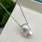 Blue-blooded fish tail Baroque Cuban link pendant by NEPTUNE PEARL